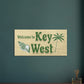 Welcome to Key West Large Canvas Wall Print - Caribbean Rays