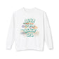 White sweatshirt with 'Born to be a Beach Girl' text and beach-themed graphics on a white background at Caribbean Rays