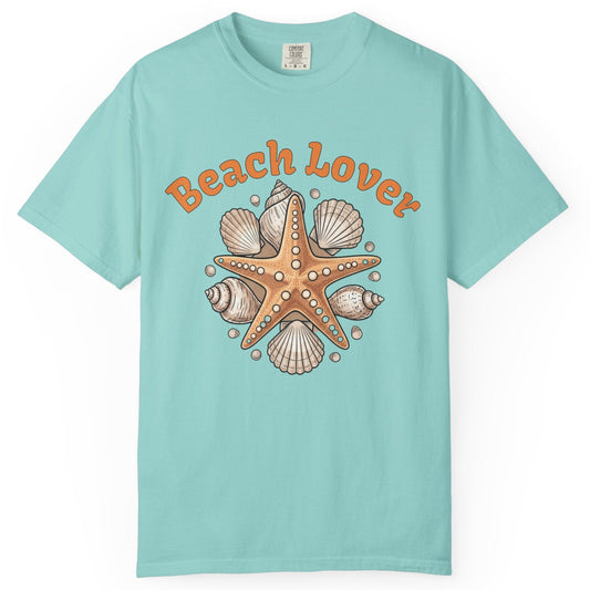 Light blue t-shirt with starfish and shell design and 'Beach Lover' text on a white background