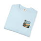 Light blue t-shirt with beach graphic and text on a white background
