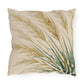 Decorative pillow with leaf pattern on a white background