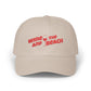 Beige cap with red text 'Wine and Beach' on a white background