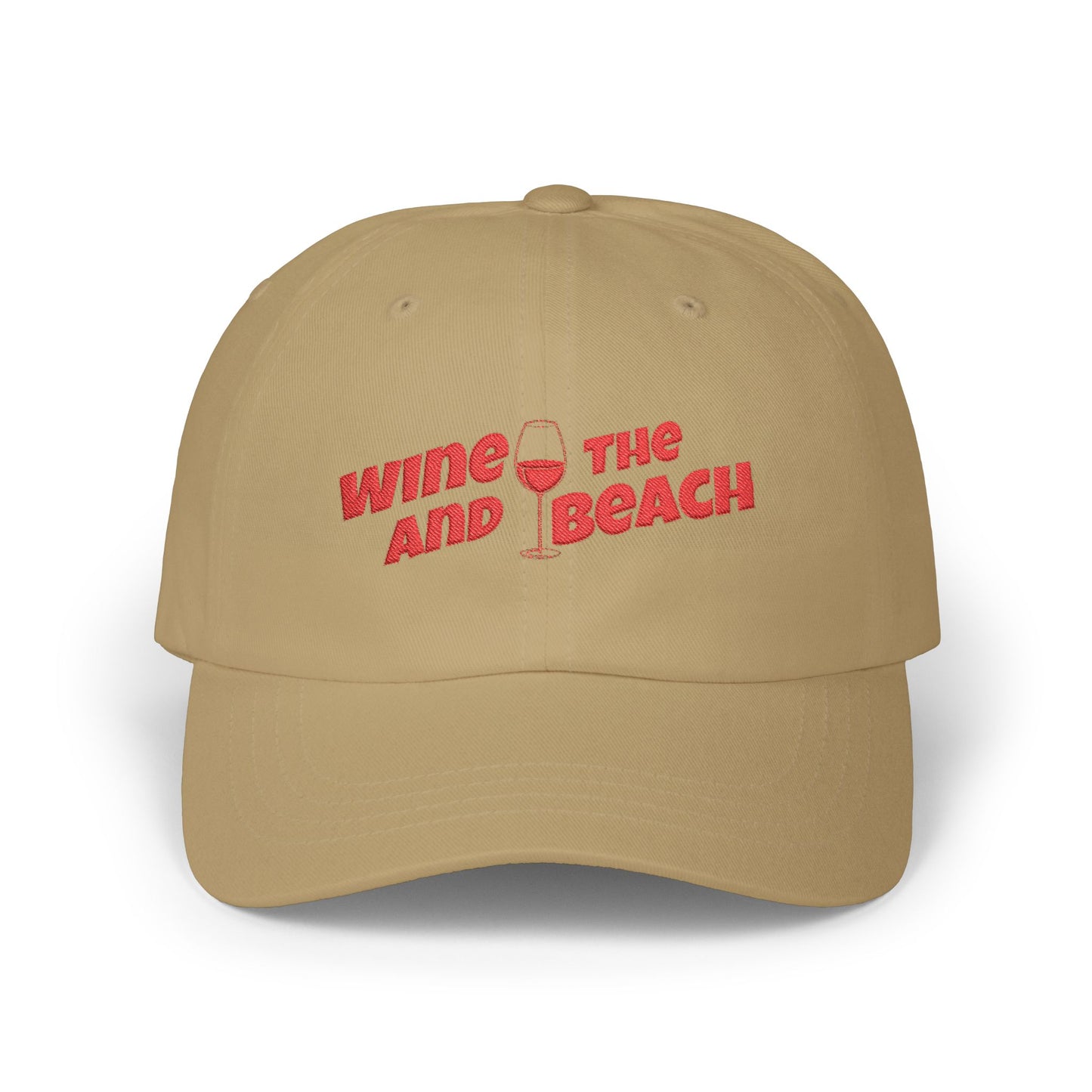 Beige cap with red text 'Wine and Beach' on a white background