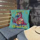 Decorative pillow with a parrot design and 'Just Living the Island Life' text on a bench.