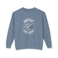 A dusty blue crewneck sweatshirt with a white graphic print on the chest featuring a golf club head and the words 'DRIVE FOR SHOW'.