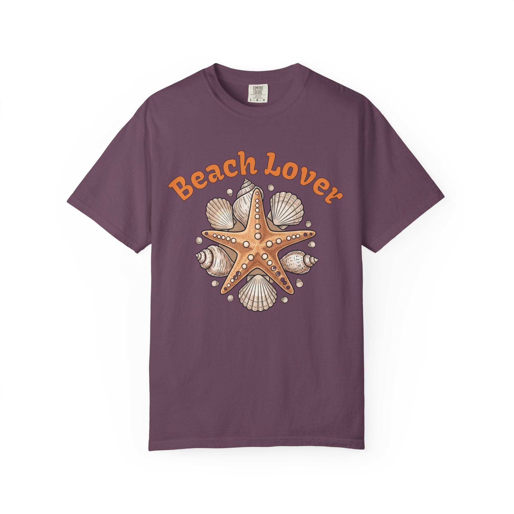 Purple t-shirt with starfish and shell design and 'Beach Lover' text on a white background