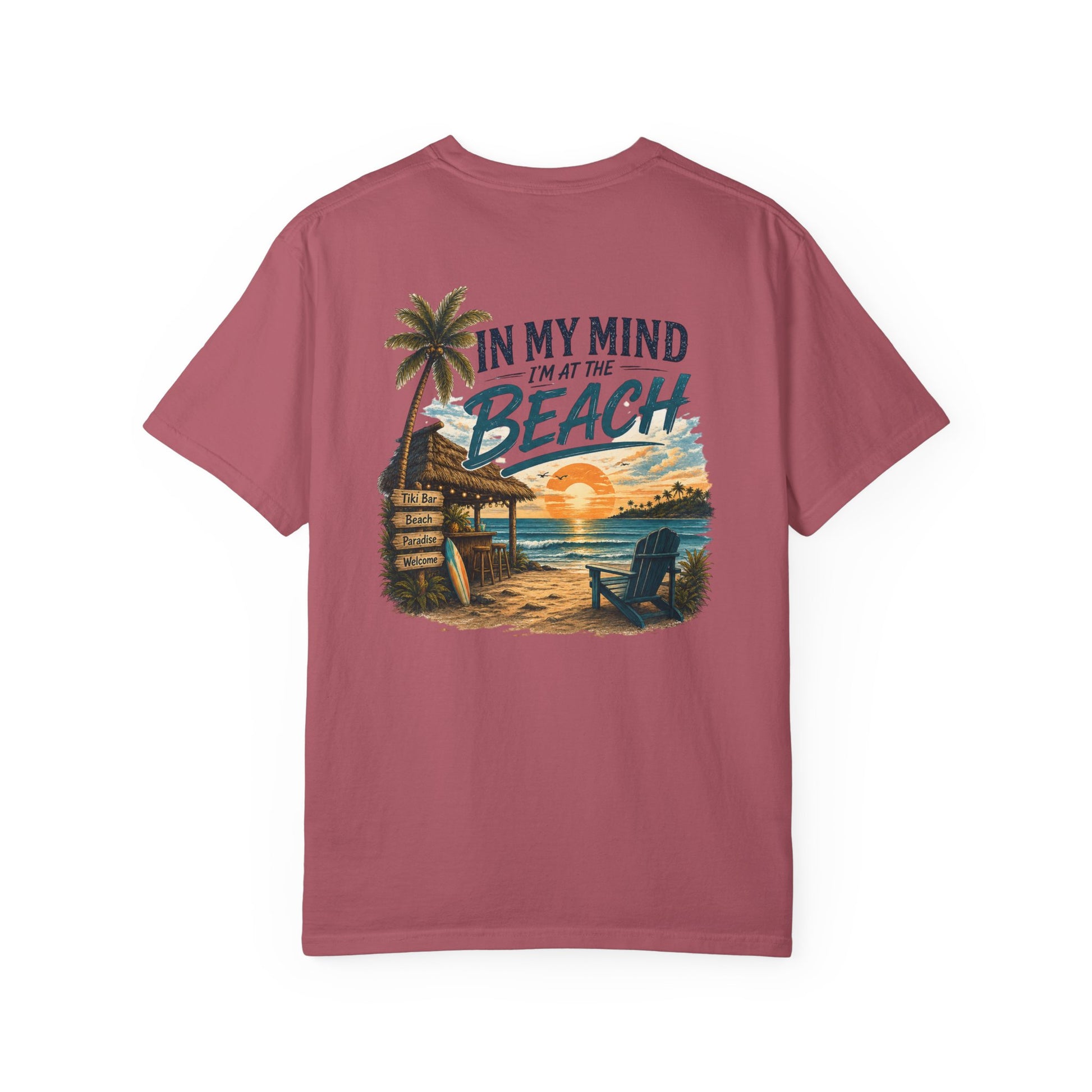 Maroon t-shirt with beach graphic and text on a white background
