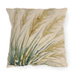 Decorative pillow with leaf pattern on a white background