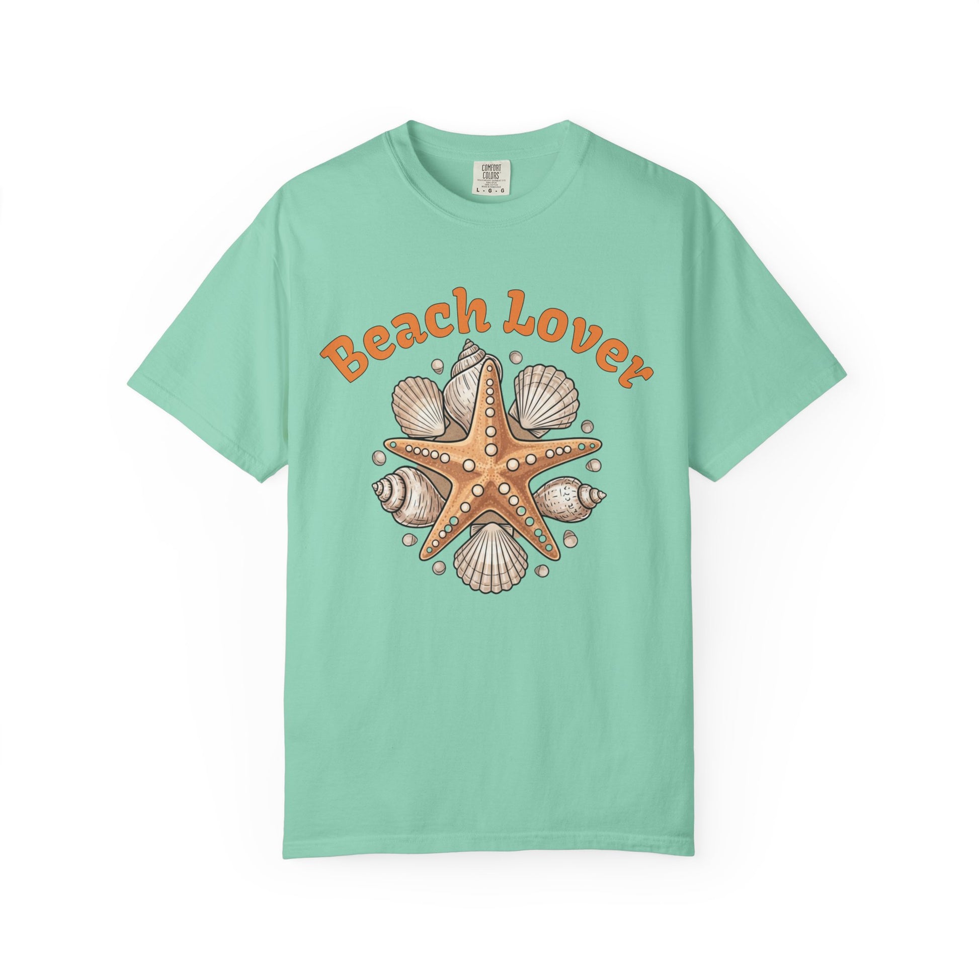 Mint green t-shirt with starfish and shell design and 'Beach Lover' text on a white background