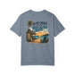 Blue t-shirt with beach graphic and text on a white background
