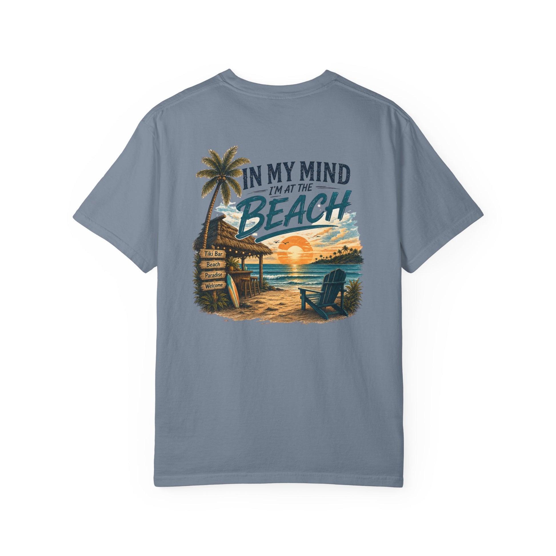 Blue t-shirt with beach graphic and text on a white background