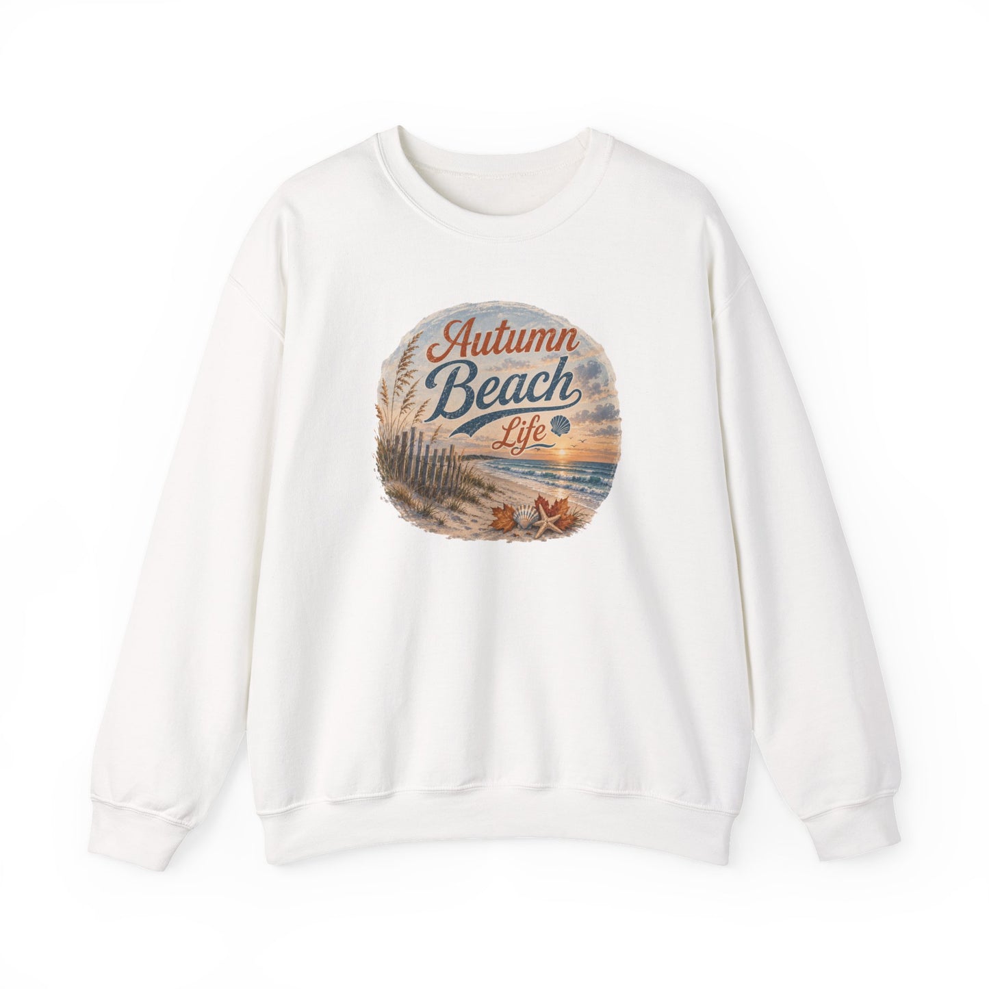 An off-white crewneck sweatshirt featuring a circular graphic on the chest with a beach scene and the text 'Autumn Beach Life'.