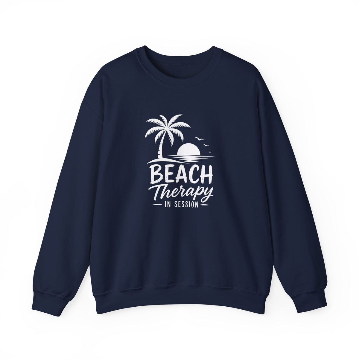 A navy blue crewneck sweatshirt with a white graphic print on the front featuring a palm tree, sunset, and the text 'BEACH Therapy IN SESSION'.