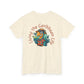 Beige t-shirt with a colorful parrot graphic and 'Living the Caribbean Life' text on a white background