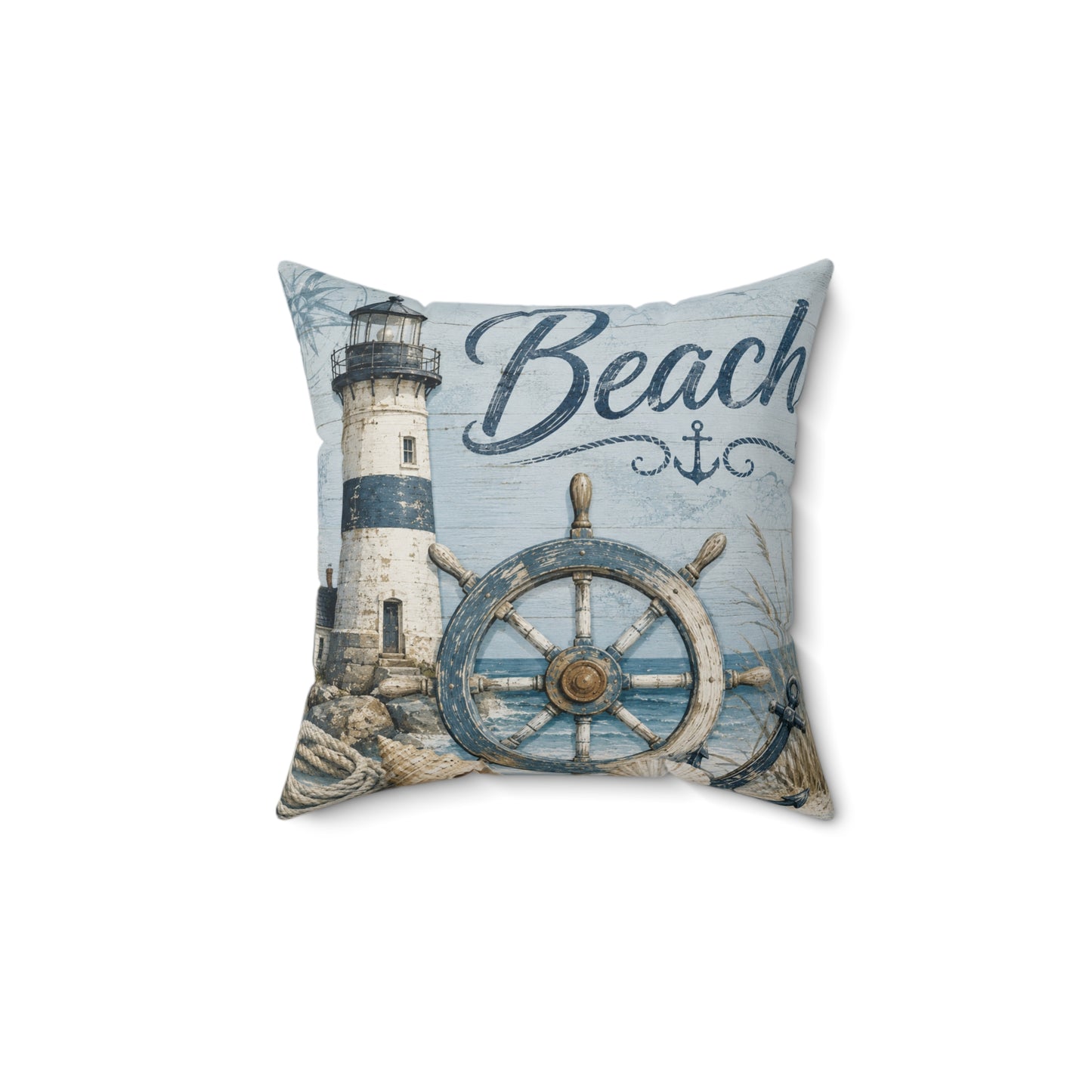A square decorative throw pillow featuring a nautical design with a lighthouse, a large ship's wheel, rope, and the word 'Beach' in script on a light blue background.