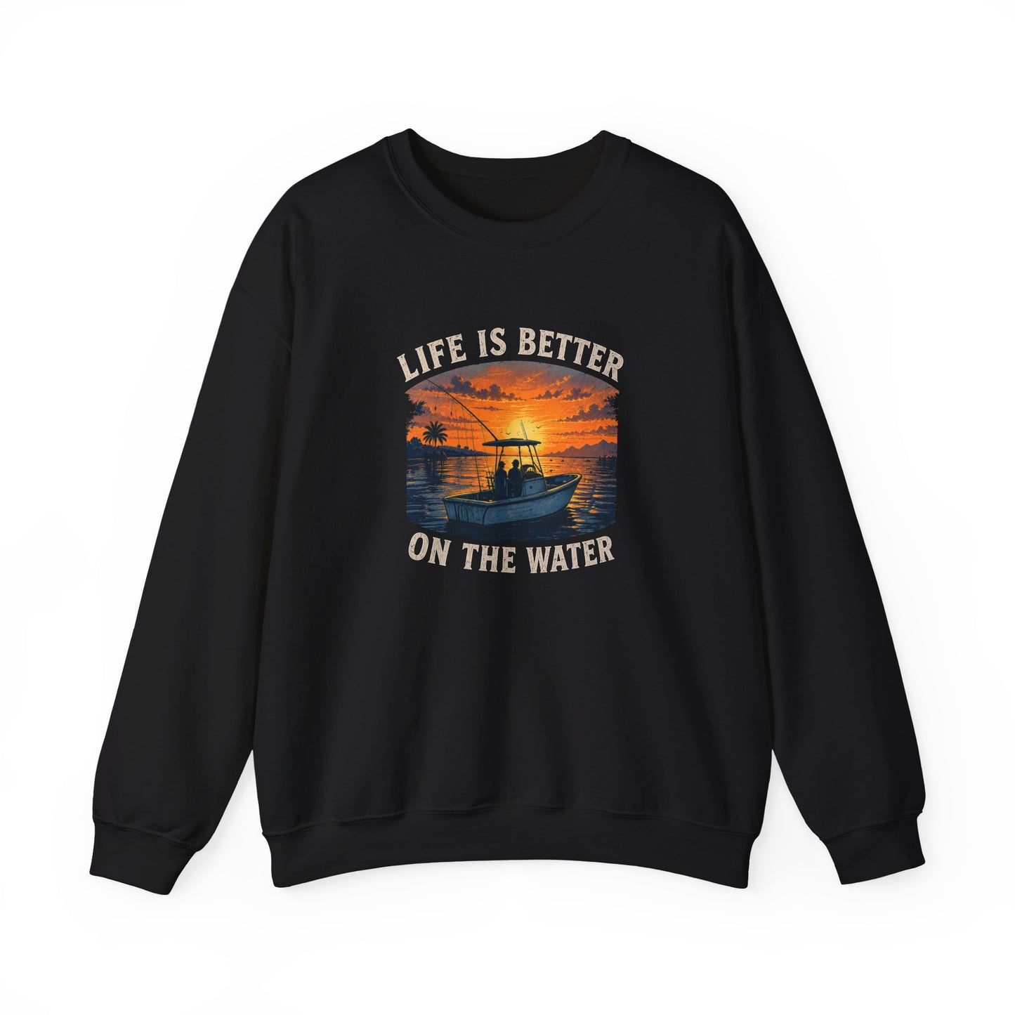 A black crewneck sweatshirt with a graphic print on the front showing a fishing boat at sunset with the text 'LIFE IS BETTER ON THE WATER' in a distressed cream font.