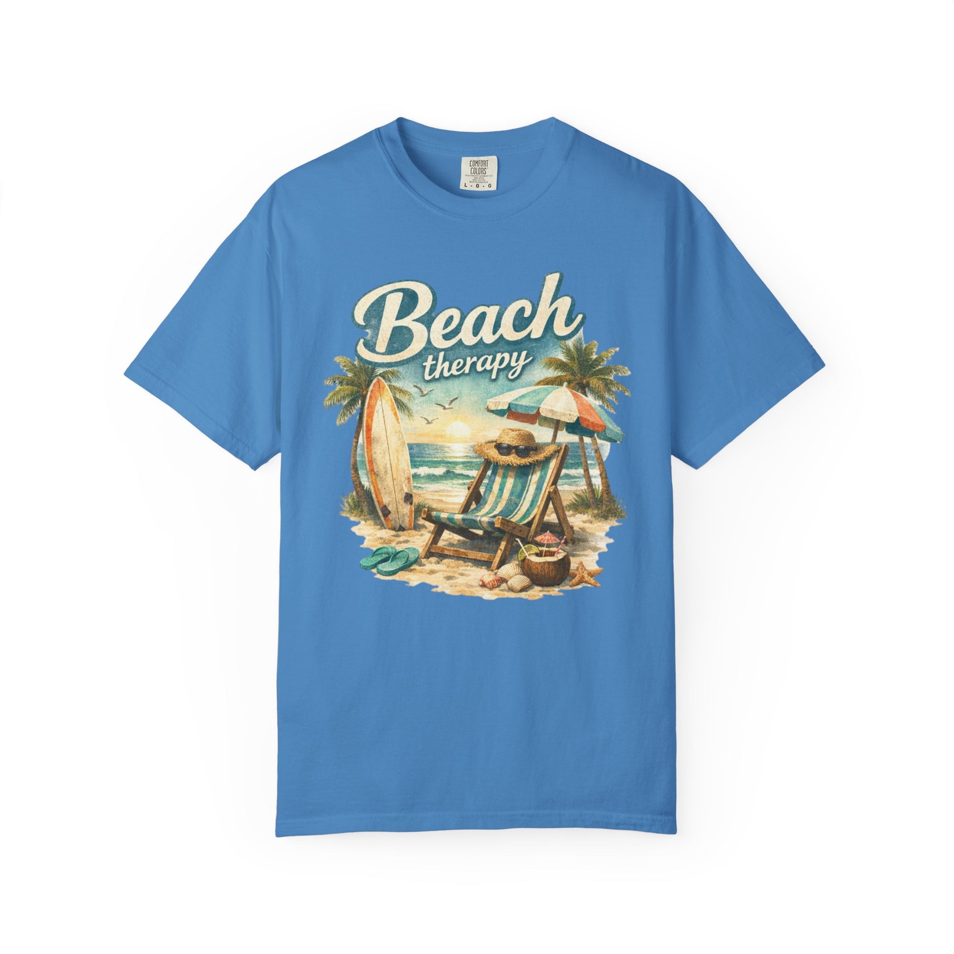 Blue t-shirt with 'Beach therapy' graphic design featuring a beach scene.