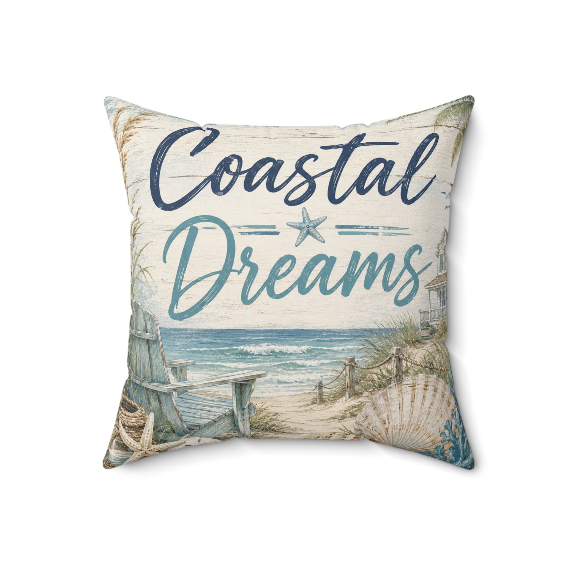 A square decorative throw pillow featuring a coastal beach scene with the words 'Coastal Dreams' in navy and teal script, shown on a plain white background.