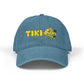 Blue cap with 'Tiki' and a cartoon character on a white background