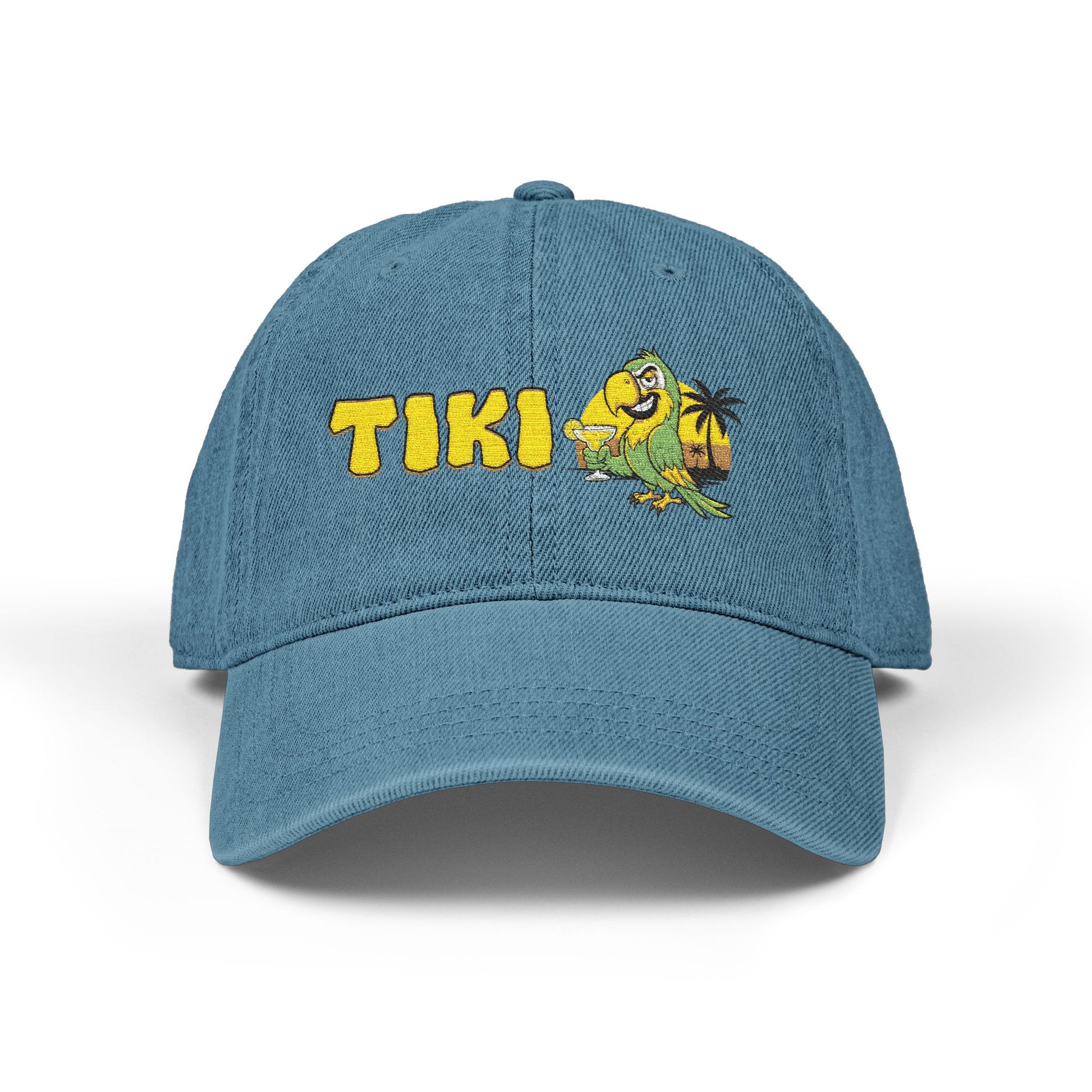 Blue cap with 'Tiki' and a cartoon character on a white background