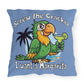 Pillow with a parrot holding a margarita and text on a blue background
