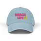 Light blue cap with 'Beach Life' text and flip-flop icons on a white background
