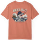 Coral t-shirt with 'Reel Big Catch' graphic on a white background