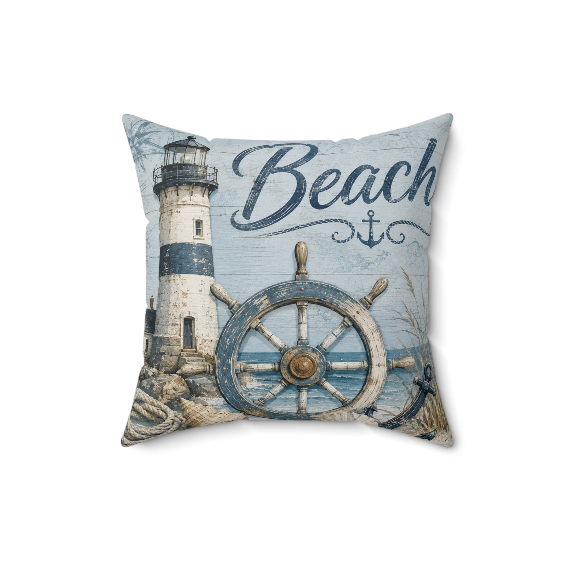 A square decorative throw pillow featuring a nautical design with a lighthouse, ship's wheel, rope, and the word 'Beach' in script on a light blue weathered background.