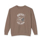 A taupe brown crewneck sweatshirt featuring a white graphic print of a golf driver head with the text 'DRIVE FOR SHOW' on the chest, displayed against a solid white background.