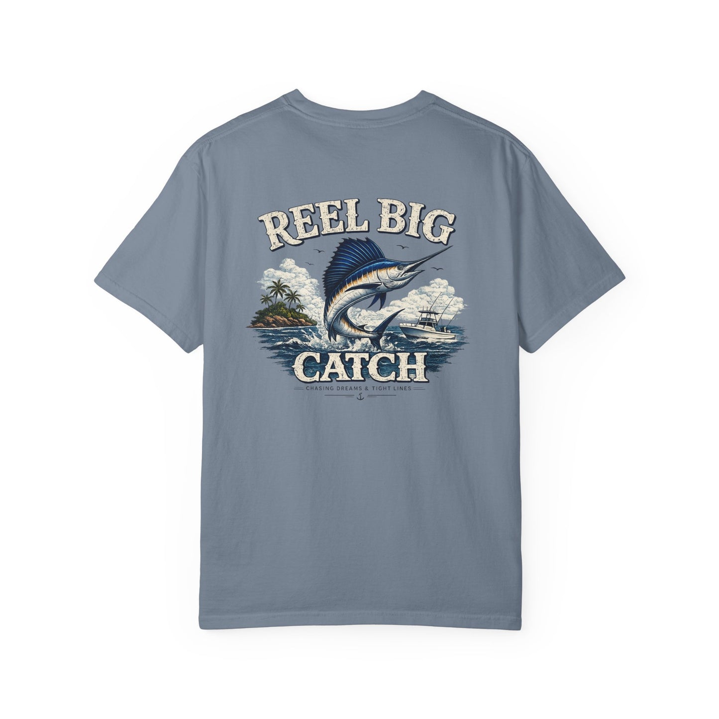 Blue t-shirt with 'Reel Big Catch' graphic design on a white background