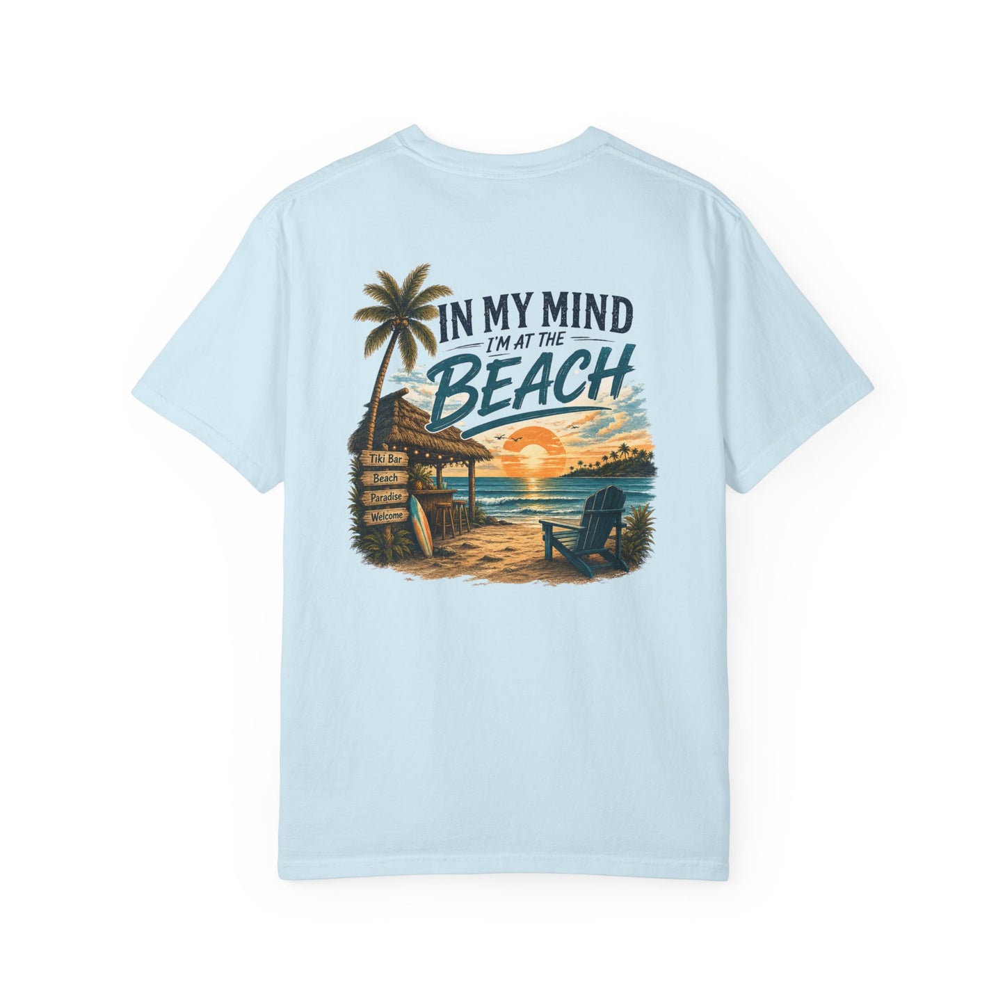 Light blue t-shirt with beach graphic and text on a white background