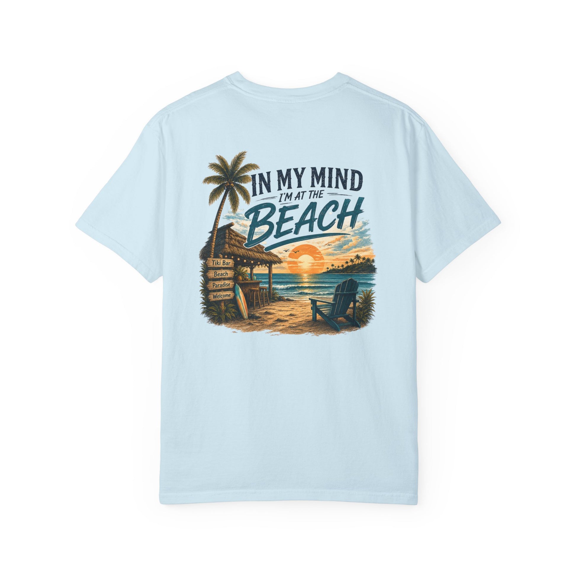 Light blue t-shirt with beach graphic and text on a white background