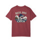 Maroon t-shirt with 'Reel Big Catch' graphic and text on a white background