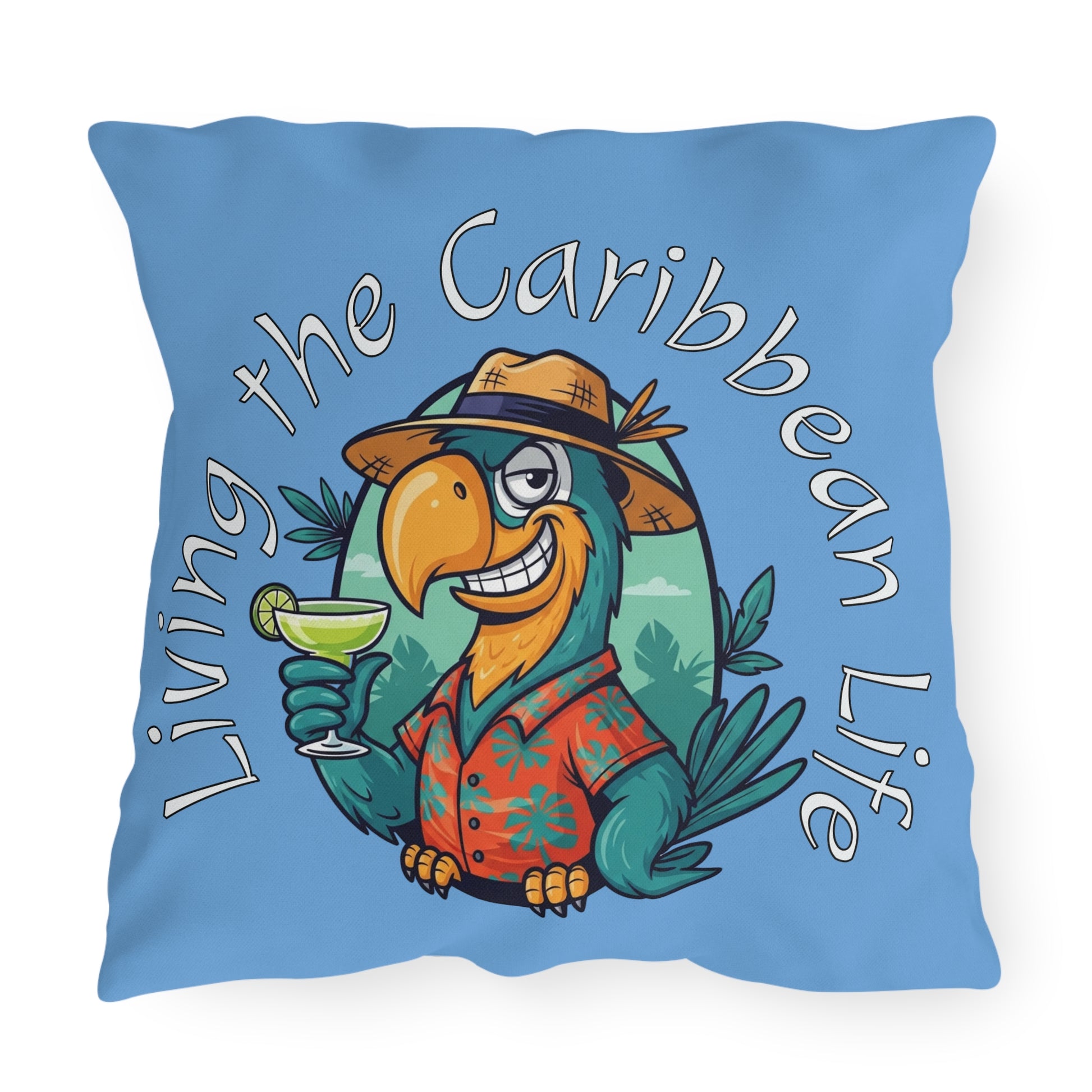 Decorative pillow with a parrot design and 'Living the Caribbean Life' text on a blue background.