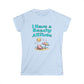 Light blue t-shirt with beach-themed design and text on a white background