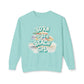 Mint sweatshirt with 'Born to be a Beach Girl' text and graphics on a white background at Caribbean Rays