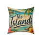 A square decorative throw pillow featuring a vintage-style tropical beach scene with palm trees, hibiscus flowers, and the words 'The Islands' in large script across the front, shown on a plain white background.