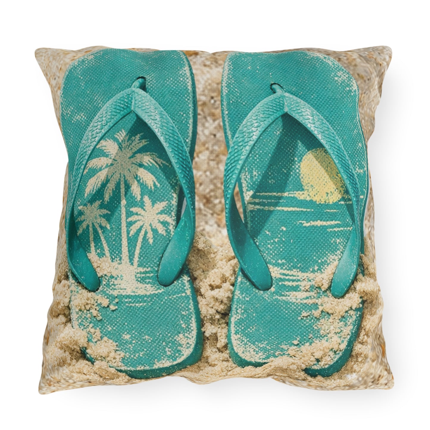 Pillow with teal flip-flops and beach scene design on a white background