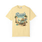 Yellow t-shirt with 'Beach Therapy' graphic featuring a beach scene on a white background