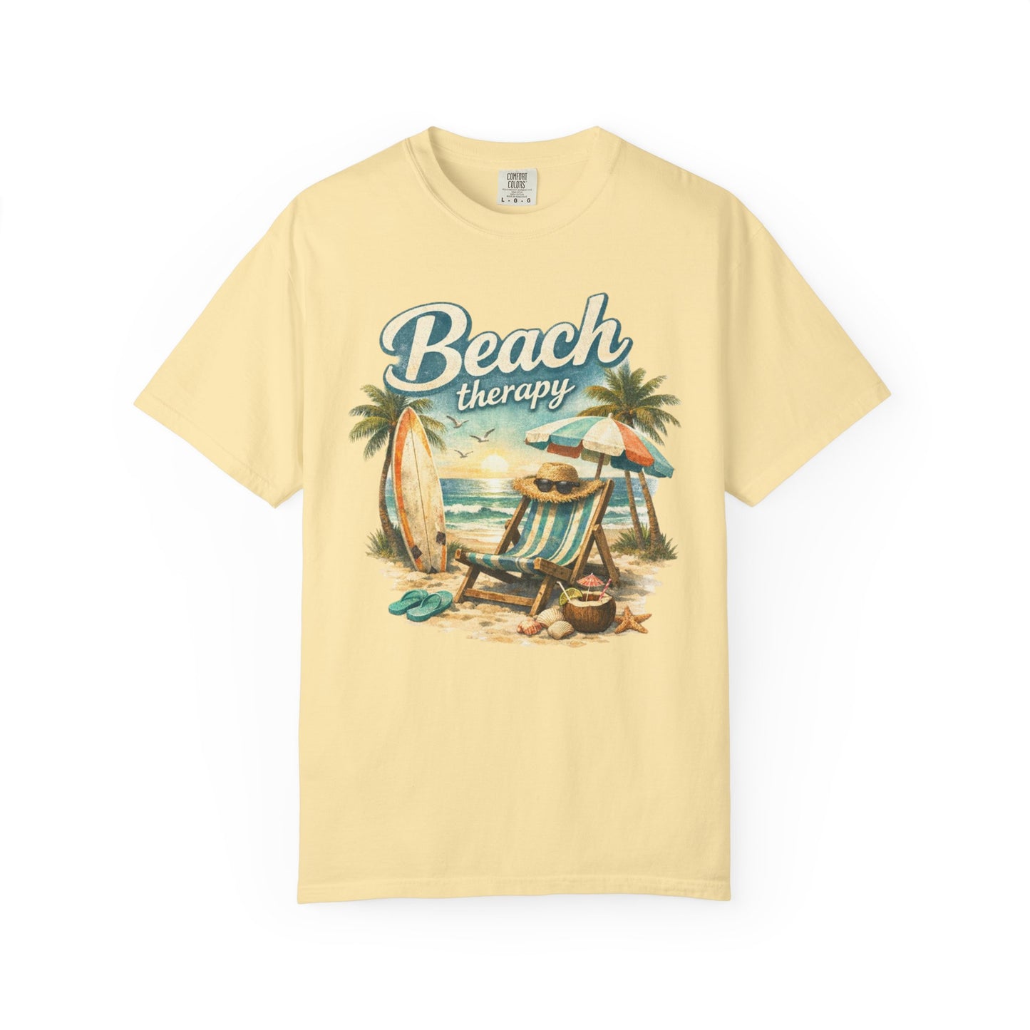 Yellow t-shirt with 'Beach Therapy' graphic featuring a beach scene on a white background