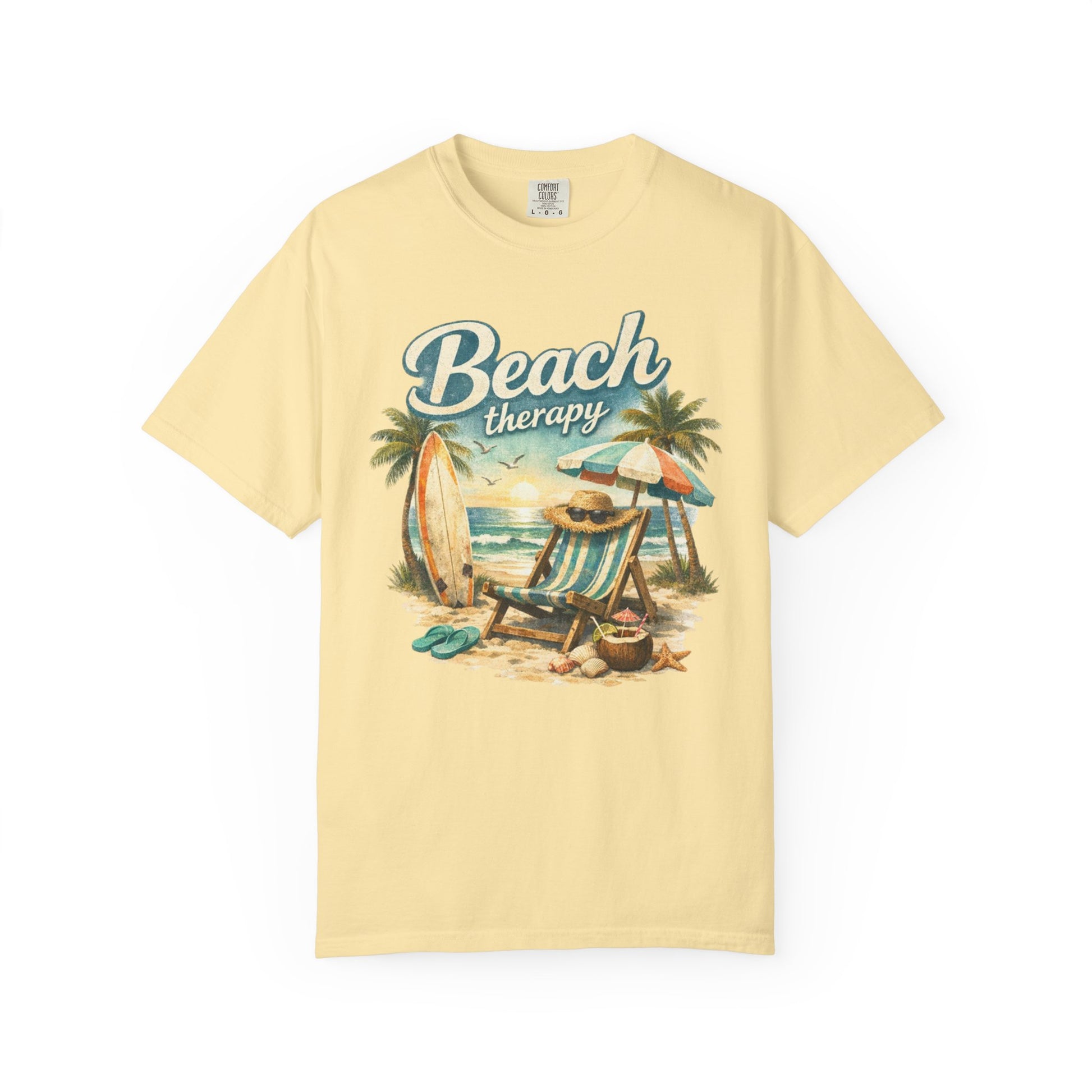 Yellow t-shirt with 'Beach Therapy' graphic featuring a beach scene on a white background