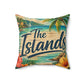 Square polyester pillow with tropical beach artwork and 'The Islands' script, corner palm accents