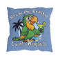 Pillow with a parrot holding a margarita and text on a blue background