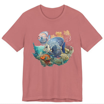 Pink t-shirt with a colorful fish and coral design on a white background by Caribbean Rays