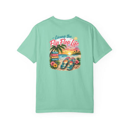 Unisex short-sleeve T-shirt in aqua green with small “Living the Flip Flop Life” front graphic