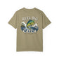 Olive green t-shirt with 'Reel Big Catch' graphic design on a white background