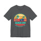 Gray t-shirt with a 'Beach Day' graphic design featuring palm trees and a sunset by Caribbean Rays