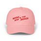 Pink cap with 'Wine and Beach' text on a white background