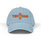 Light blue baseball cap with 'Tiki Bar' text and tiki mug graphic on a white background