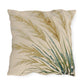 Decorative pillow with leaf pattern on a white background